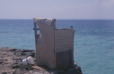 The Bathroom over an open hole to the sea. High tide was problematic