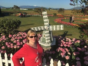 At Roozengarde gardens with windmill and Mt. Baker