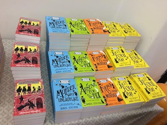 A lovely rainbow of books to be signed!