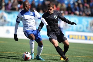 FCE's Sainey Nyassi, left, tries to keep the ball away from Minnesota's Ben Speas. PHOTO: FC EDMONTON/TONY LEWIS
