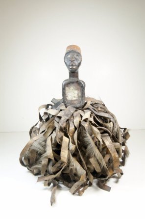 face male Nkisi figure with strips of hide