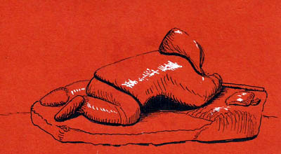 This is a small stone carving of an Inuit fisherman who is laying on the ice, looking into his fishing hole.