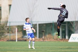 From Sunday: Minnesota's Damion Lowe leaps to head the ball away from FCE's Daryl Fordyce. PHOTO: TONY LEWIS/FC EDMONTON