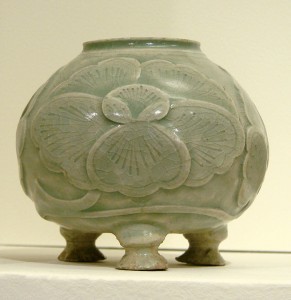 A 10th-century celadon pot from China (Musee Guimet, Paris). Celadon is a pale greyish green which takes its name from a character in the French romance Astrée by d'Urfe (1610).