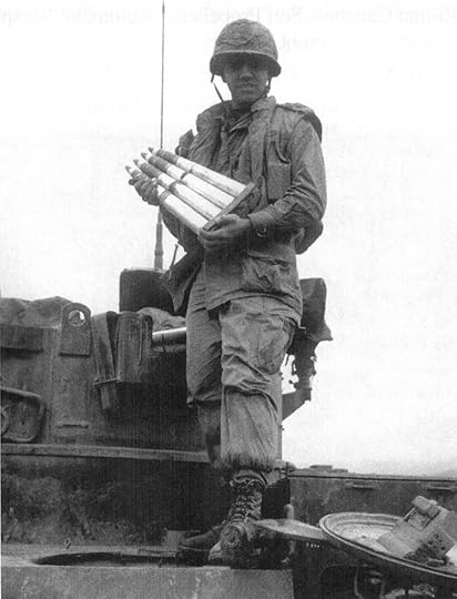 Joe Belardo with 40 mm ammo clip From his book Dusterman: Vietnam 