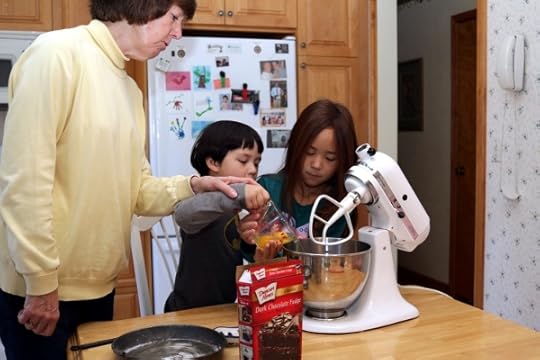 Helping Grandma make a cake for Easter.