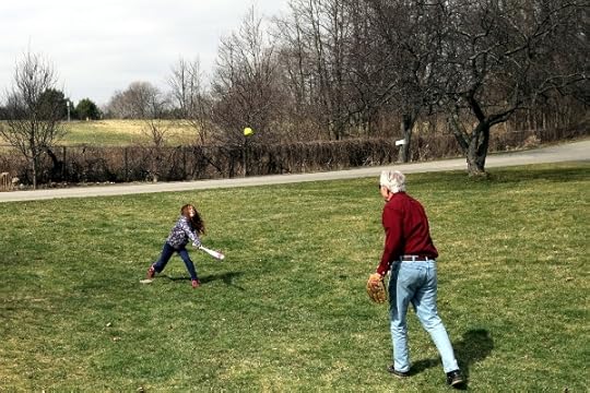 SteelyKid hitting a softball.