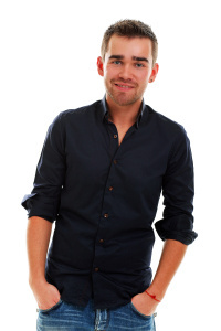 Young handsome guy isolated over white background