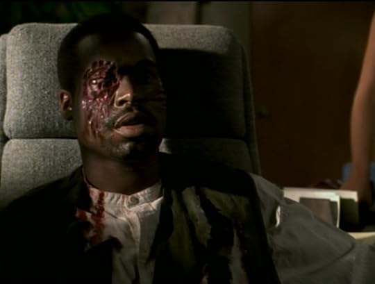 The right side of Mr. Platt's face is gouged off, exposing almost one whole eyeball. There are claw marks all over his head and face.