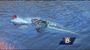 The car, underwater in Fox Pond