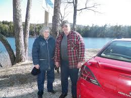 Rosemary and Leonard Wallace next to the pond where they saved three lives