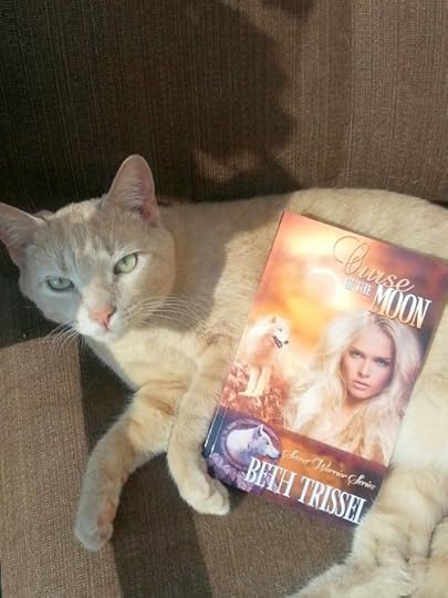 Peaches looking at Curse of the Moon.jpg2