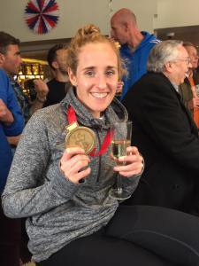 Kate with her medal and wine