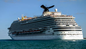 Carnival Corp. & Plc's Breeze cruise ship leaves the Port of Miami in Miami, Florida, U.S. on Sunday, March 9, 2014. Carnival Breeze was built by Italian shipbuilder Fincantieri SpA. Photographer: Christina Mendenhall/Bloomberg via Getty Images