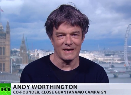 A screenshot of Andy Worthington discussing the Gitmo Clock and Obama's chances of closing Guantanamo before he leaves office on RT on April 25, 2016.