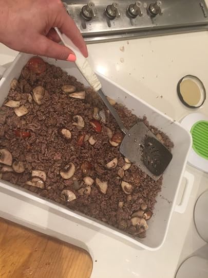 Patting the mince and vegies into shape