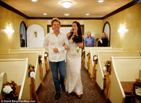 Jon Bon Jovi walks Branke Delic down the isle. Note: Same chapel Bon Jovi got married in himself. Further note: same Elvis impersonator chapel. I sh** you not!