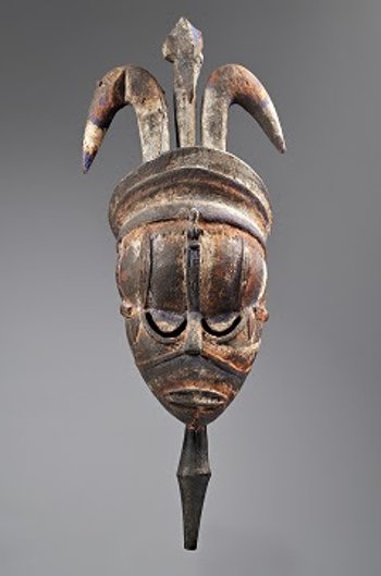 Urhobo artist, Mask, 1800–10. Wood, pigment, and metal. Promised Museum Acquisition from the Holly and David Ross Collection