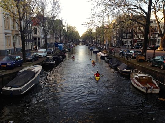 Kayaks on a canal in Amsterdam.