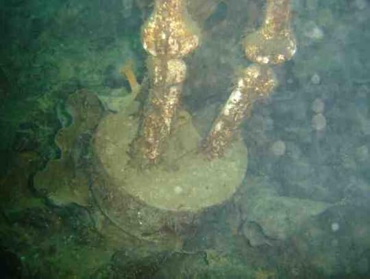 The body wearing cement shoes was found on Monday morning along a Brooklyn beach.