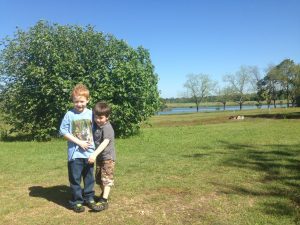 My boys in front of Mammy's fig tree. She made the best fig preserves on the planet and no one has ever been able to recreate them.