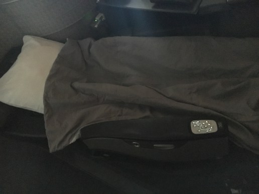 Seat folded into a lie-flat bed