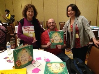 Star student Josh Funk holds his debut picture book, Lady Pancake and Sir French Toast, between me and his classmate, writer-illustrator Doreen Buchinski