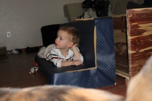 Hand stitch the sides on in a similar manner, just, try not to poke the baby.