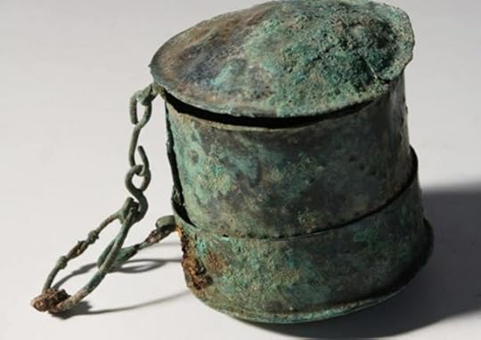 A workbox found in the grave of a woman.