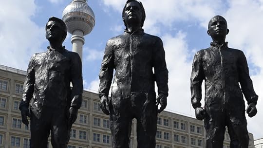 Lifesize bronze sculpture featuring (L-R) former National Security Agency (NSA) contractor and whistleblower Edward Snowden, WikiLeaks founder Julian Assange and former US soldier Chelsea Manning convicted of violations of the Espionage Act, on May 1, 2015 at Alexanderplatz square in Berlin. (AFP Photo / Tobias Schwarz)