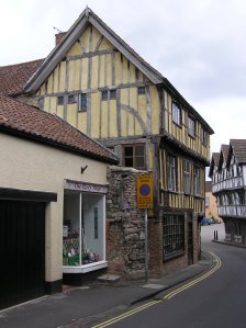 This narrow Medieval street from a town in Dorset gives a sense for the architecture and feel of 14th century London.