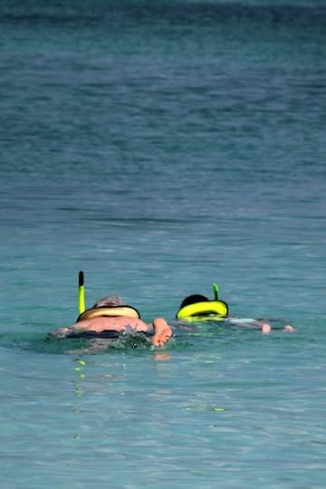SteelyKid learning to snorkel from Grandpa.