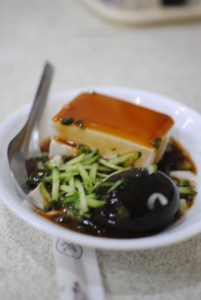 Tofu with thousand-year-old-egg (lower right of bowl).