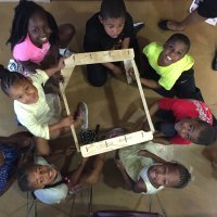 Community outreach meeting at Barclay community center in April, where local kids built a cnc-ed chair held together with zip-ties. Photo by Will Holman