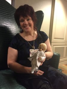 Jane Fancher with doll.