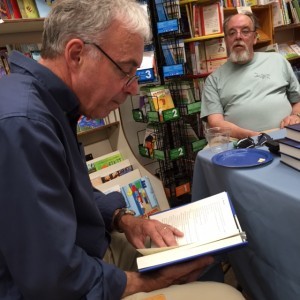 Gerry Boyle reads from Once Burned at a dual book signing in Waterville, Maine, last June.