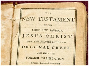 Photo of the aged title page an old 19th century English translation of the New Testament; reads: The New Testament of Our Lord and Saviour Jesus Christ. Newly translated out of the Original Greek: and with the Former Translations diligently compared and revised.