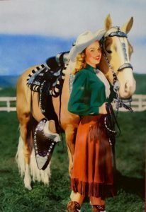 Gimme old school country, and maybe a fringe skirt, and definitely a horse
