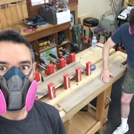 Sanding/scraping edge-banding like a couple of bosses!