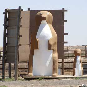 Which is also fun. I've been here. Did I get my picture taken with the giant prairie dog and pet the six-legged steer? Yes, I did.
