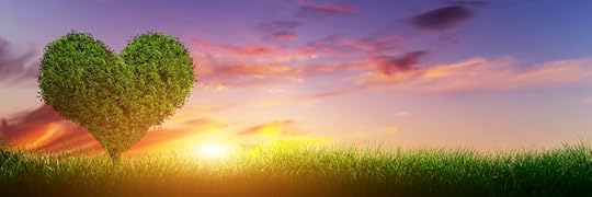 Heart shape tree on green grass field landscape at sunset. Panorama, banner. Love symbol, concept for Valentine's Day, wedding etc.