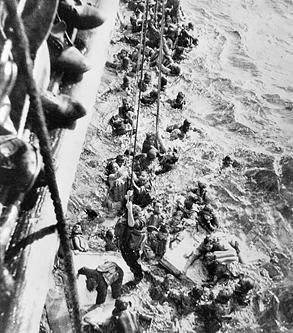 Survivors of battleship Bismarck being pulled aboard HMS Dorsetshire, 27 May 1941 (Imperial War Museum)