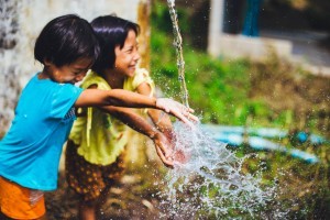 photo of two girls laughing
