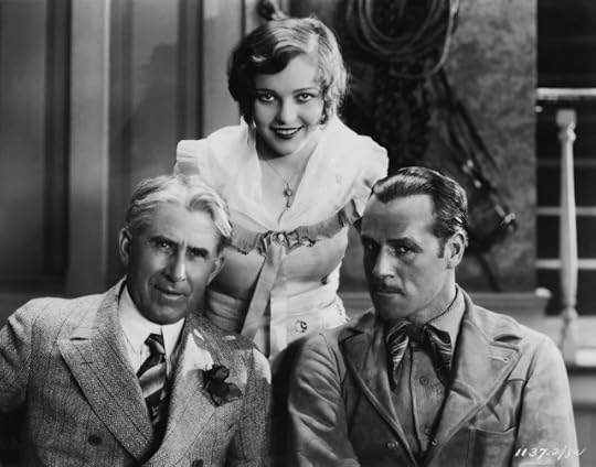 1928 --- Winning Combination: Zane Grey, author of which Paramount is now filming, with Jack Holt, the featured lead, and Sally Blane, leading lady. The picture was taken on set at the studio when Grey visited there. 1928, directed by John Waters. --- Image by © Bettmann/CORBIS