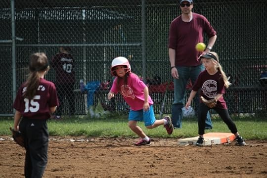 SteelyKid running as the ball is hit.