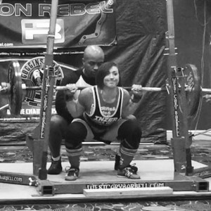John Greaves III spotting powerlifter/figure athlete Tori Betollati