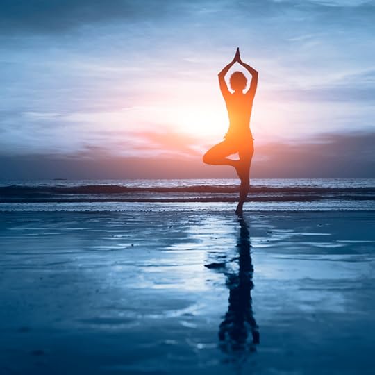  silhouette of woman practicing yoga