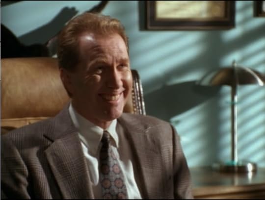 The Mayor is just a normal ginger dude in a brown suit and an ugly tie.