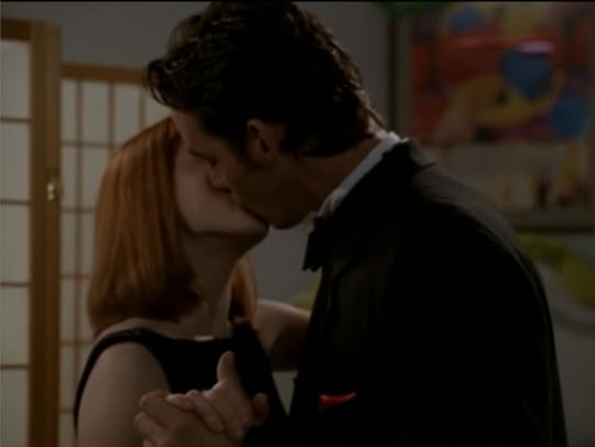 Willow and Xander are kissing. Not even like a little peck. Full on kiss.