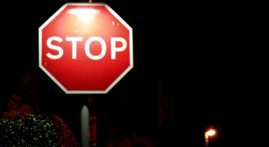 image of a stop sign at night